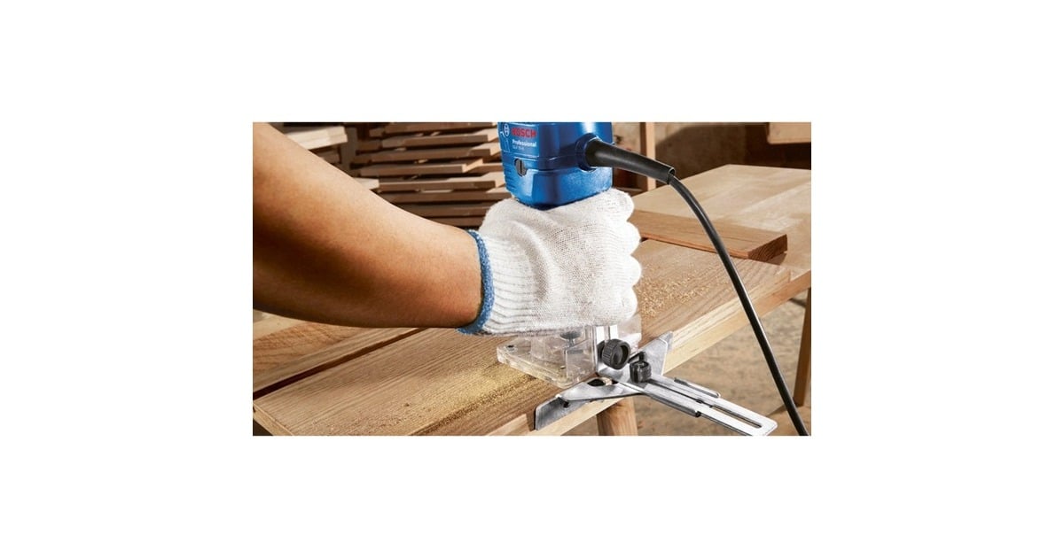 Bosch Professional Kantenfräse GLF 55-6 (550-W-Motor, Drehzahl 33.000 min⁻¹, inkl. 2x Einmaulschlüssel, 1x Spannzange, Parallelanschlag, Führungsrolle zum Bündigfräsen