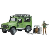 bruder Land Rover Defender Station Wagon, Modellfahrzeug grün/schwarz, Inkl. Förster und Hund